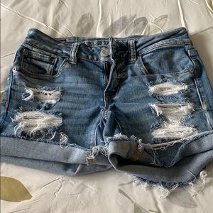 Distressed denim shorts